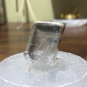 Marcasite rutile in Iceland spar calcite rhombohedron